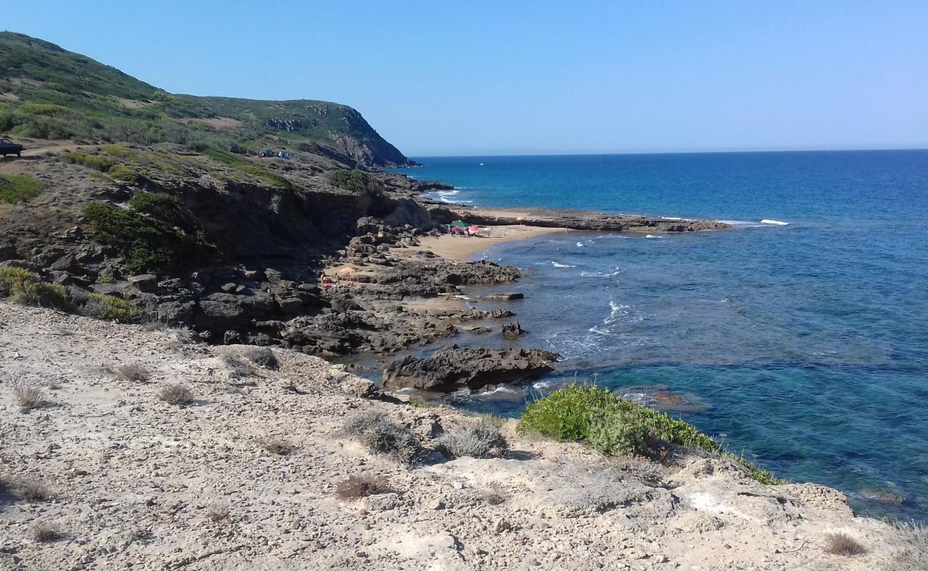 Фото Cala dello Scoglio Rosso с камни поверхностью