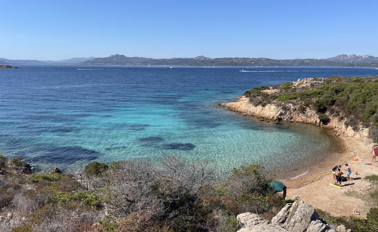 Фото Cala Degli Inglesi с белая чистая галька поверхностью