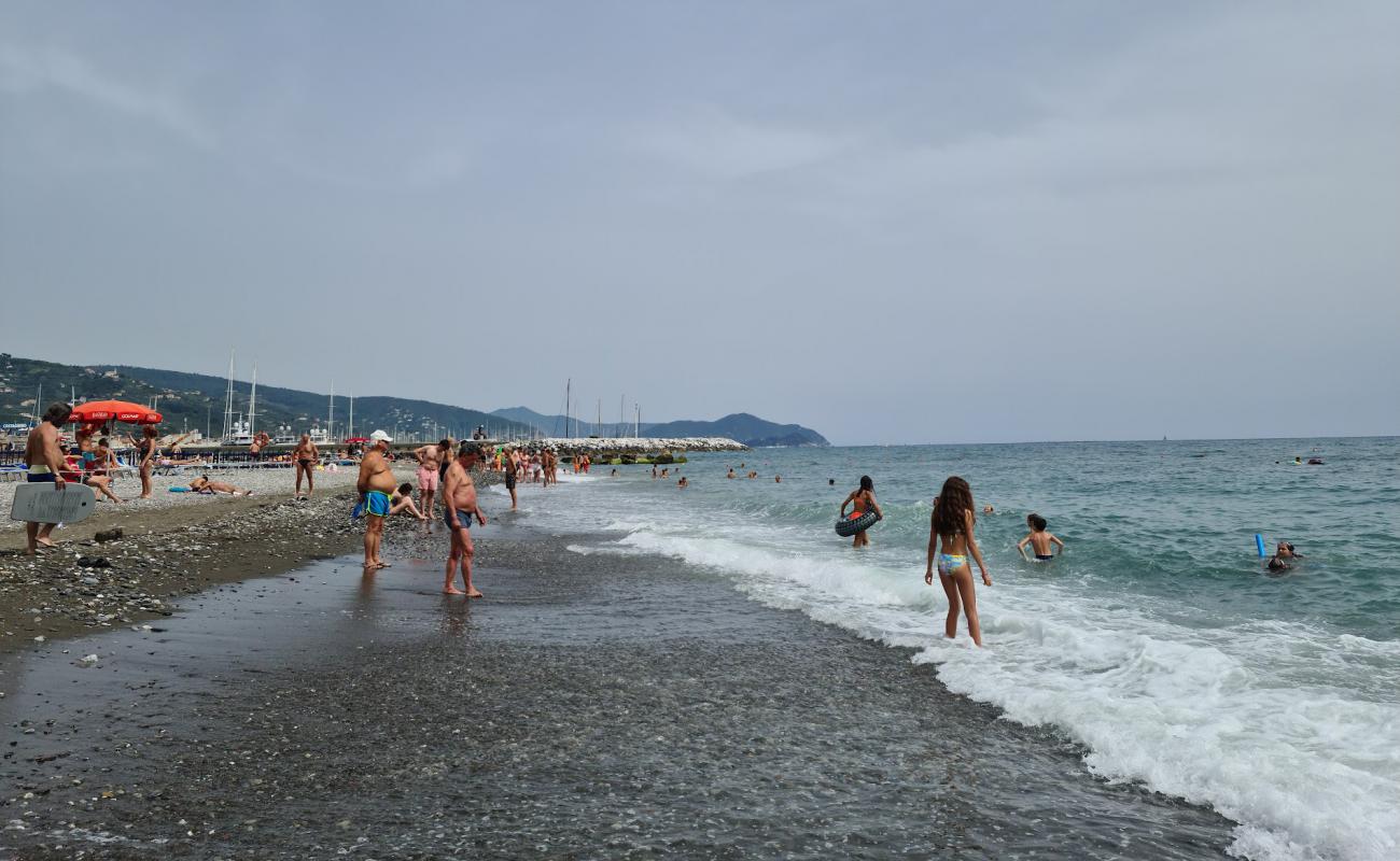 Фото Spiaggia Tito Groppo с песок с галькой поверхностью