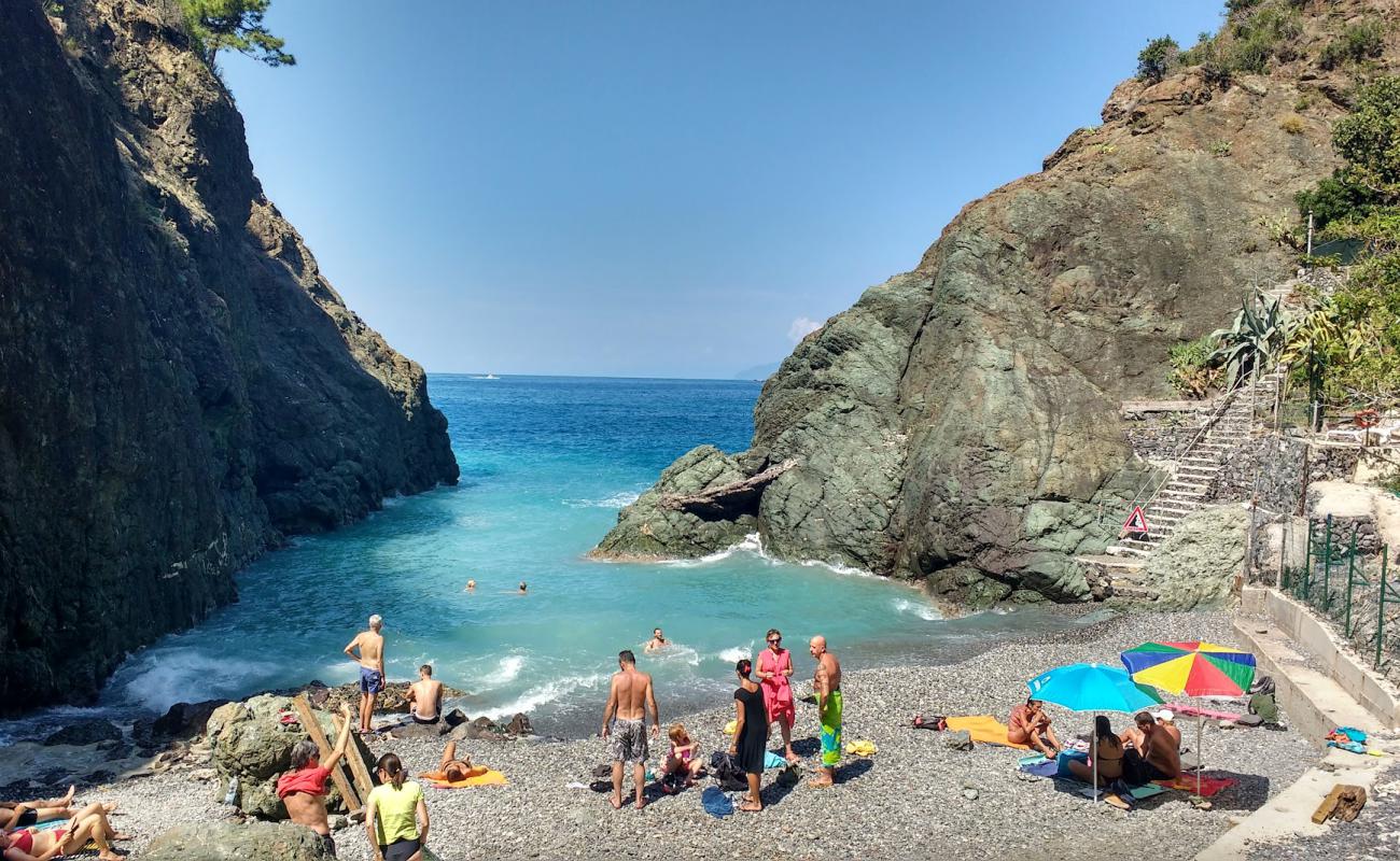 Фото Spiaggia di Porto Pidocchio с серая галька поверхностью