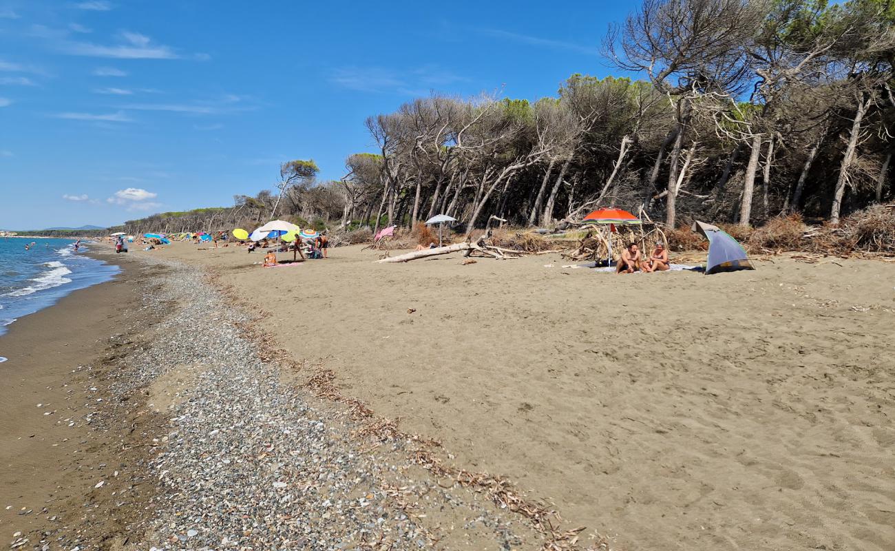 Фото Bau Beach Le Gorette с светлый песок поверхностью