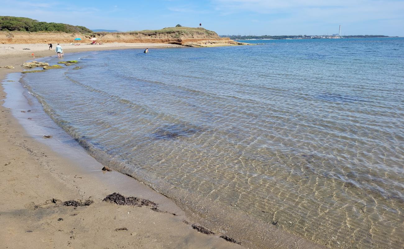 Фото Punta delle Quaglie Lido с серый песок поверхностью