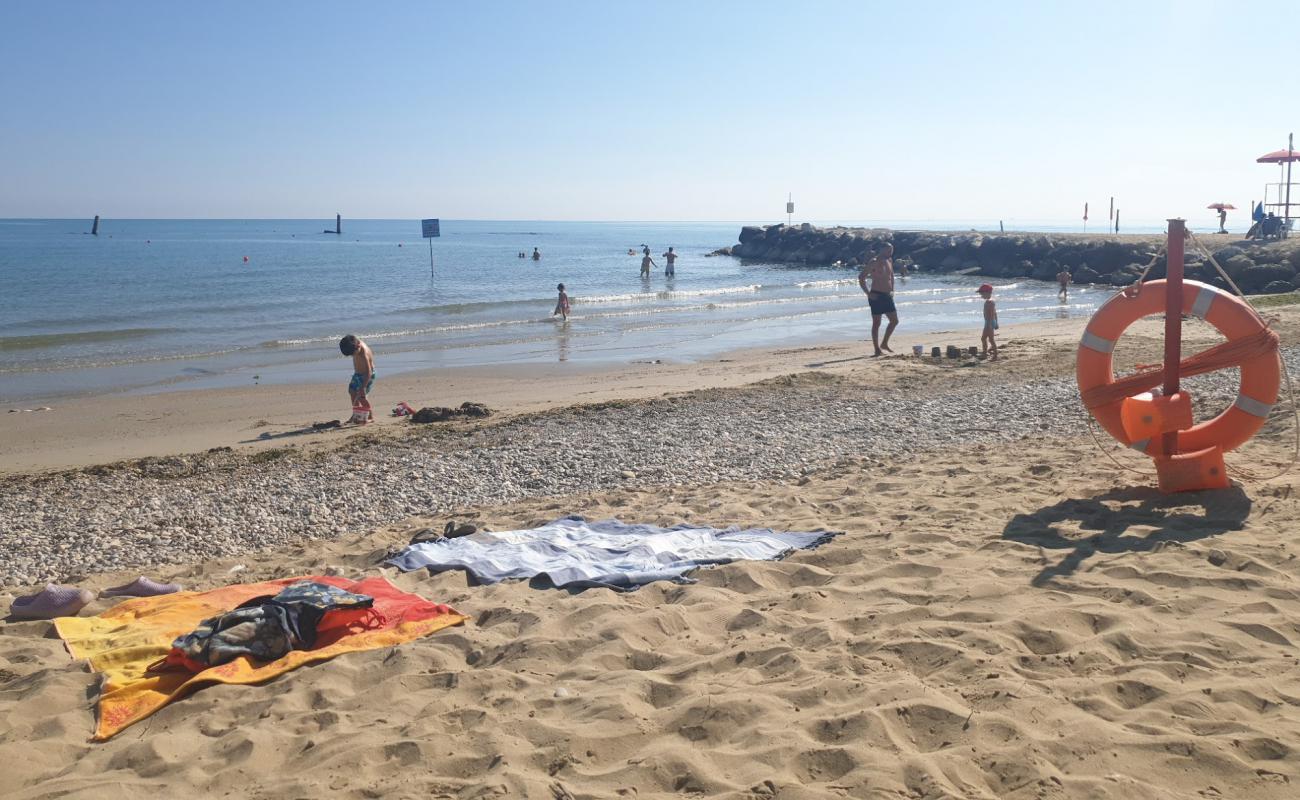 Фото Spiaggia dei PuraVida с серый песок поверхностью