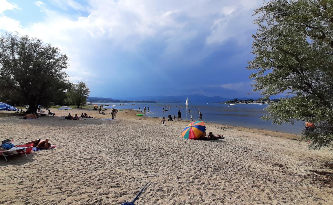 Фото Spiaggia Cicognola с светлый песок поверхностью