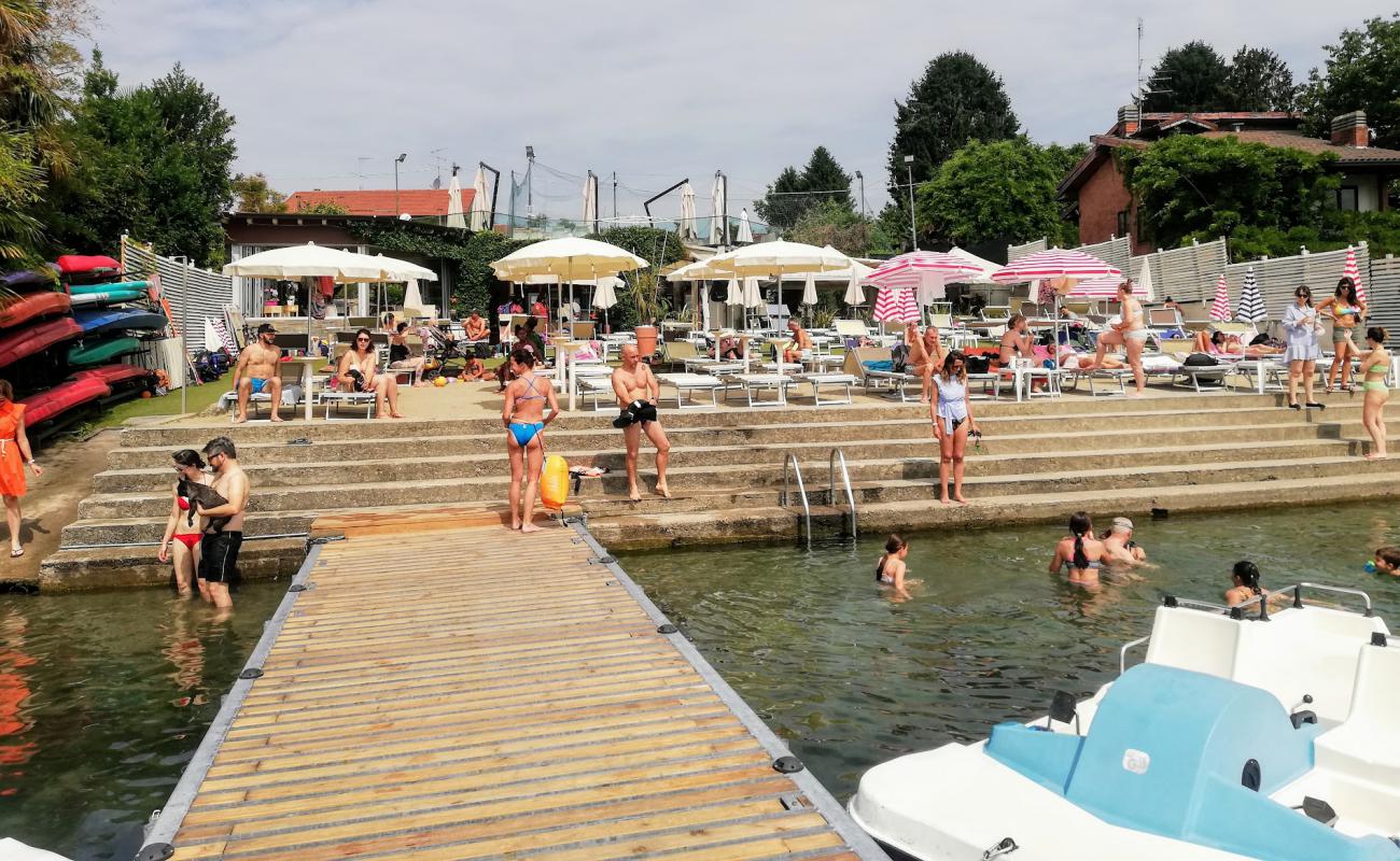 Фото Spiaggia La Playa с бетон поверхностью