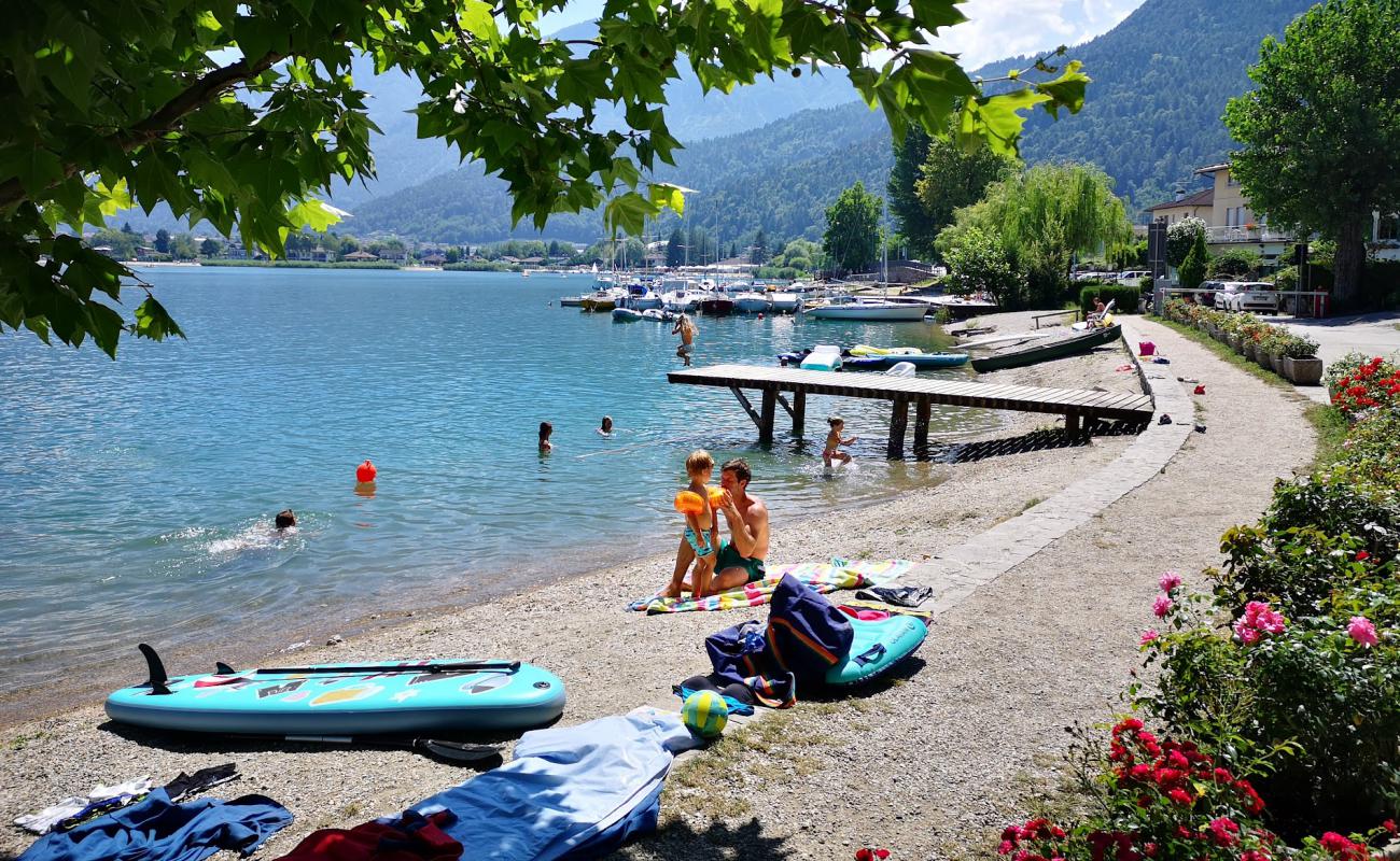 Фото Spiaggia Penisola Verde с серая чистая галька поверхностью