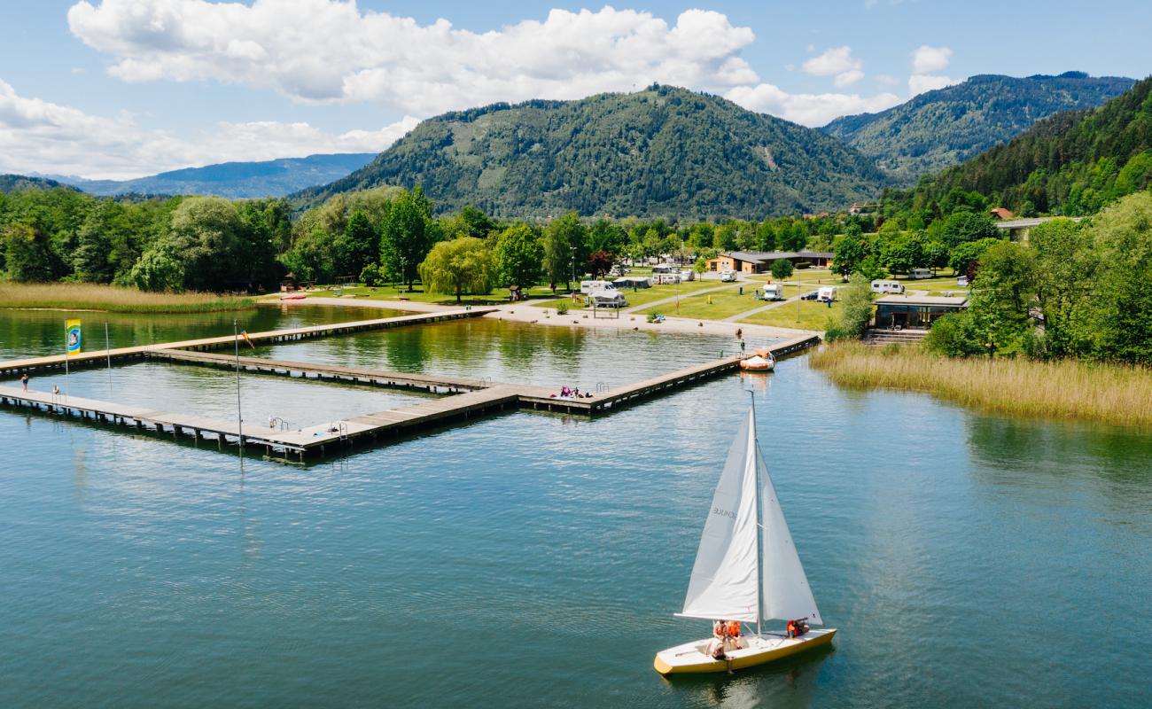 Фото Seebad Ossiacher See с белая чистая галька поверхностью