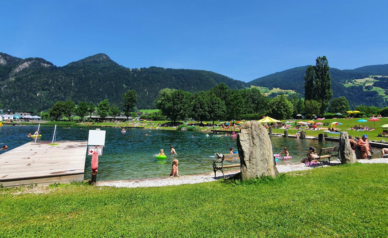 Фото Naturbadesee с трава поверхностью