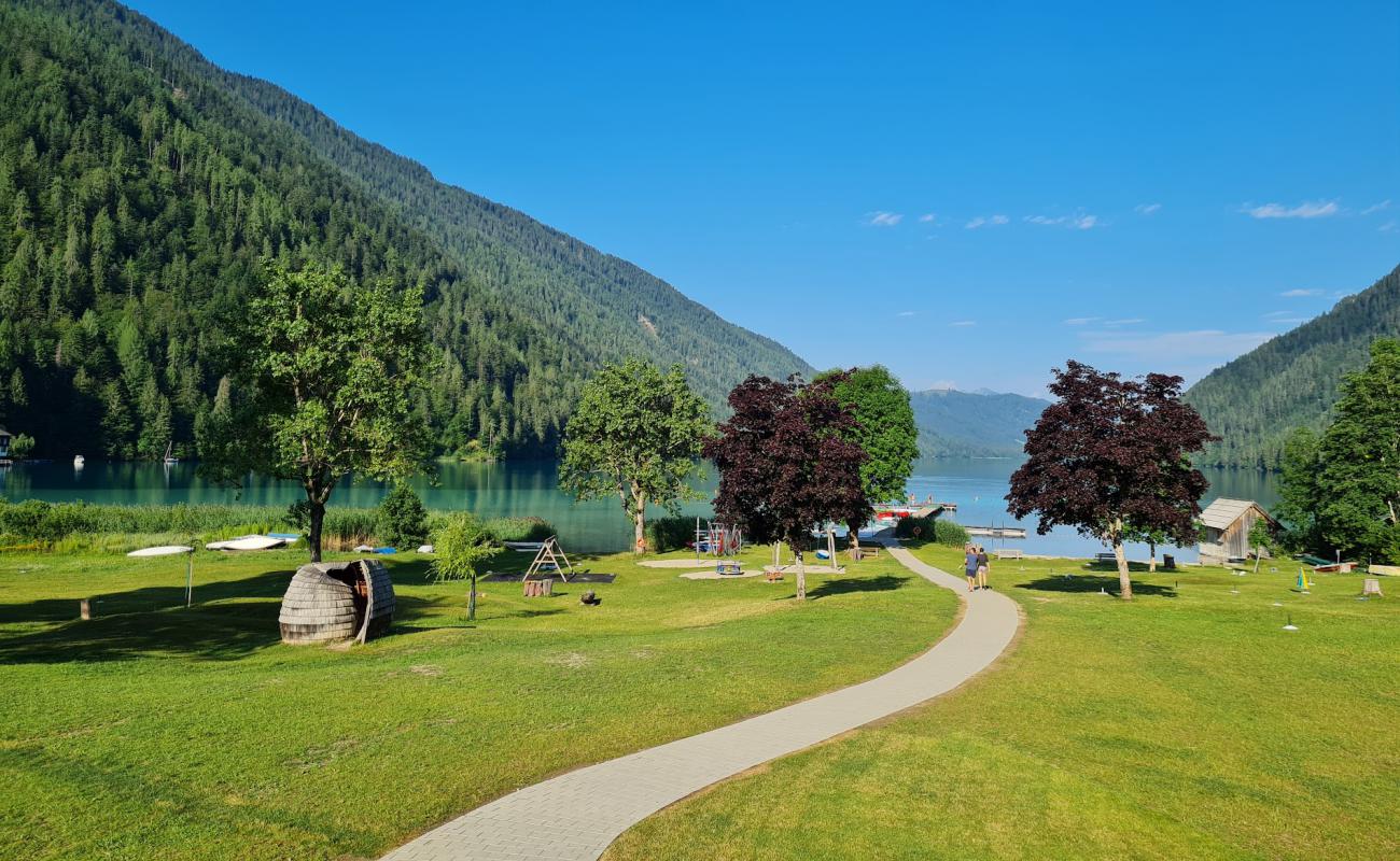 Фото Strandbad Stockenboi с трава поверхностью