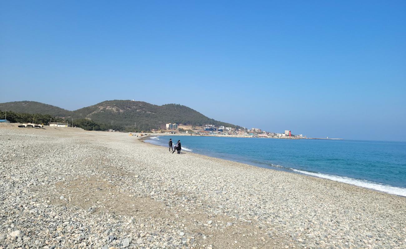 Фото Jojorigan Beach с серая галька поверхностью