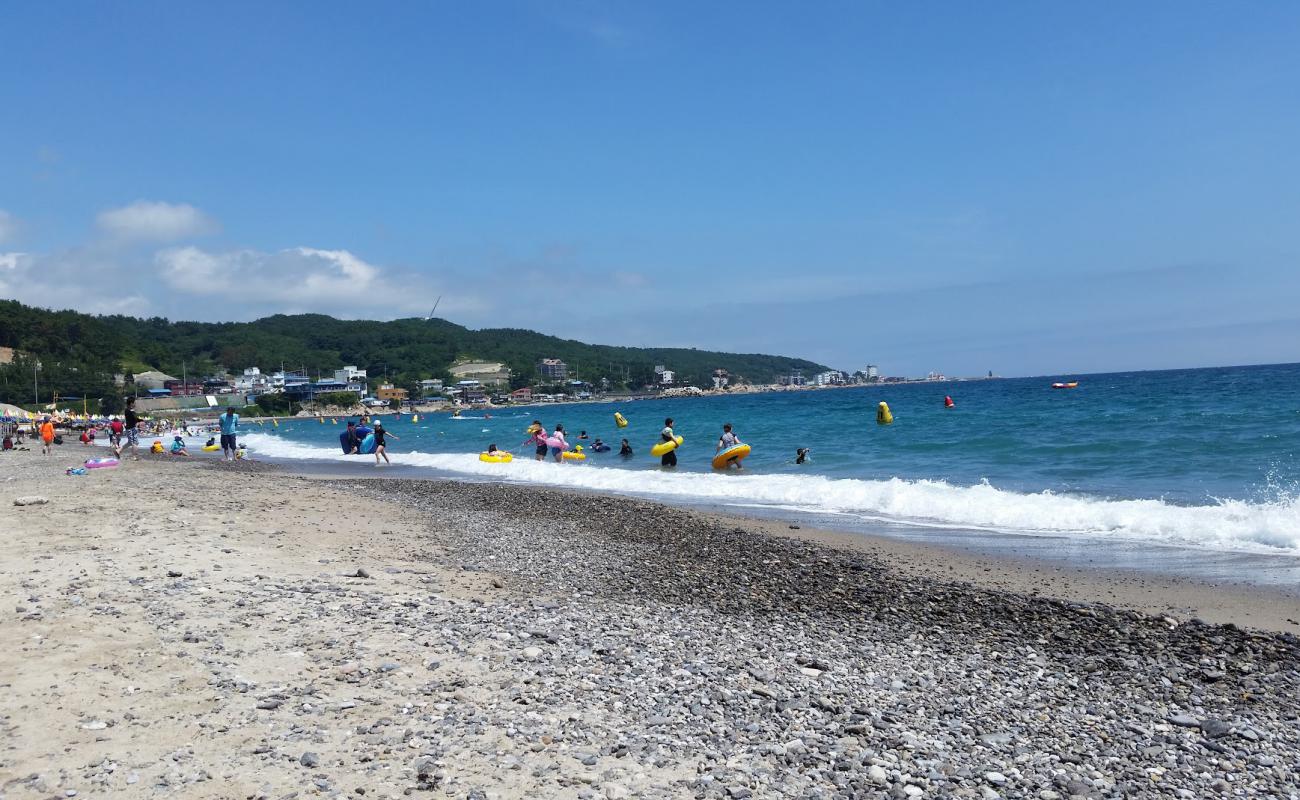 Фото Oryu Beach с серая галька поверхностью