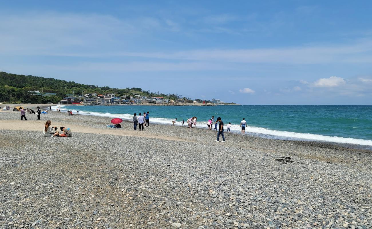 Фото Bonggil Beach с песок с галькой поверхностью