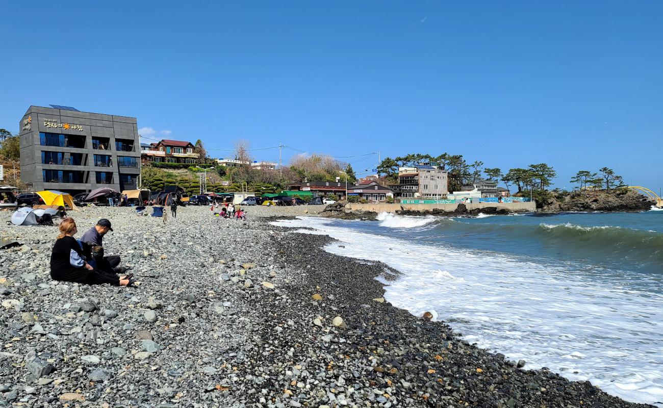 Фото Ulsan Beach с серая галька поверхностью