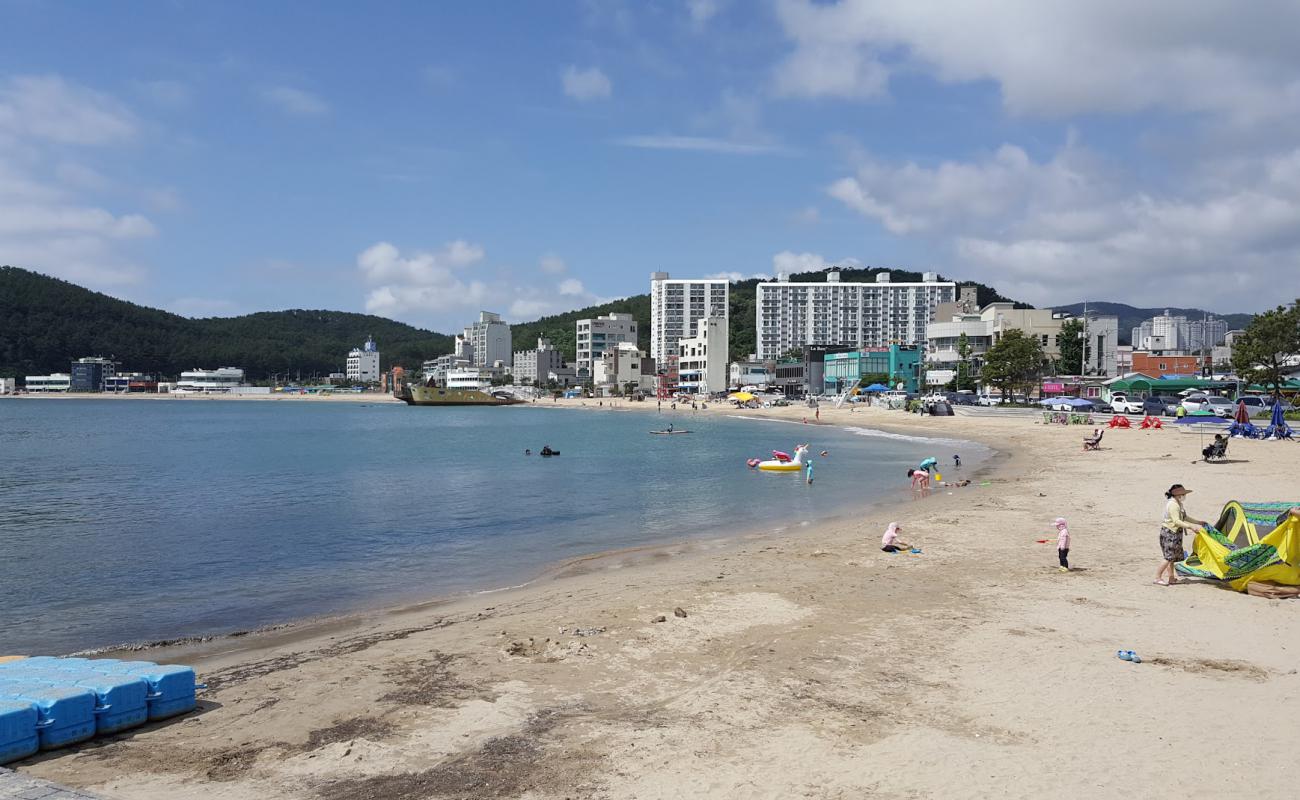 Фото Ilgwang Beach с светлый песок поверхностью