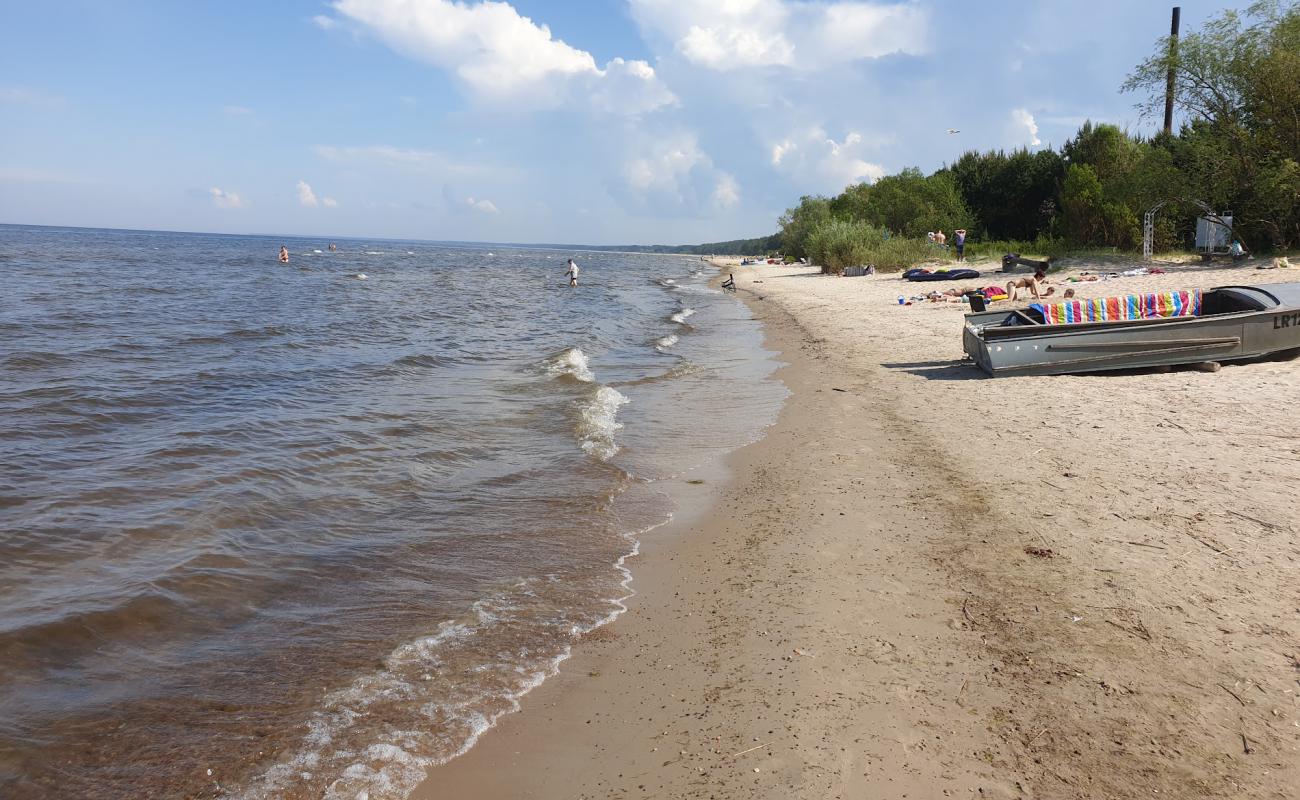 Фото Plienciema kapa beach с светлый песок поверхностью