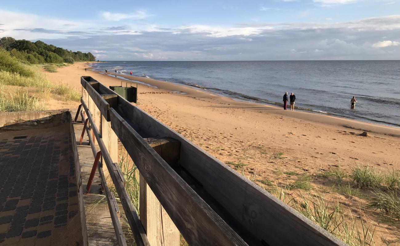 Фото Tujas beach с золотистый песок поверхностью