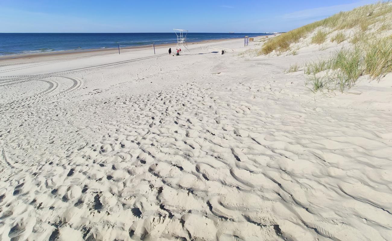 Фото Smiltyne Beach с золотистый песок поверхностью