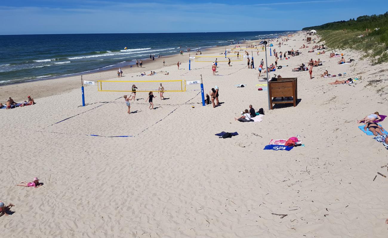 Фото Giruliai beach II с золотистый песок поверхностью