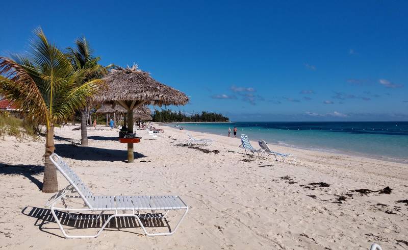 Фото Taino beach с золотистый песок поверхностью