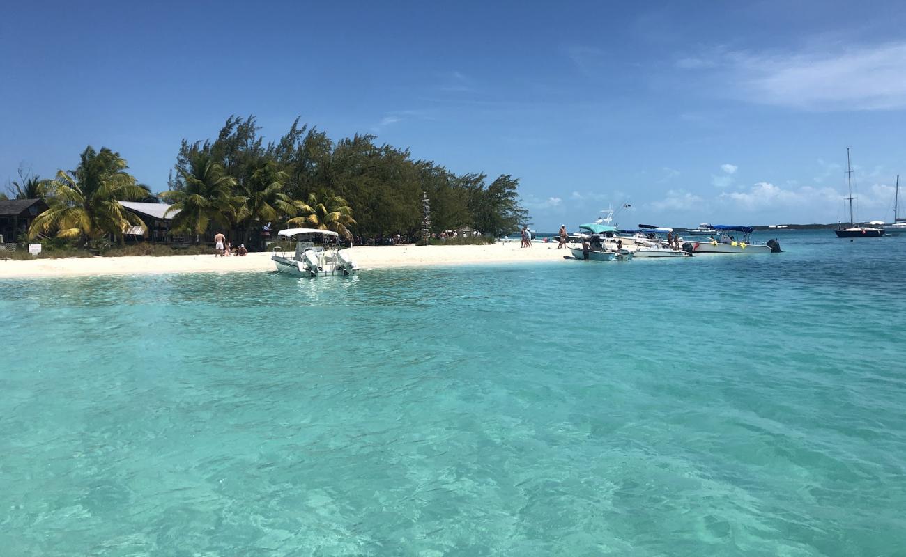 Фото Mare beach с белый чистый песок поверхностью