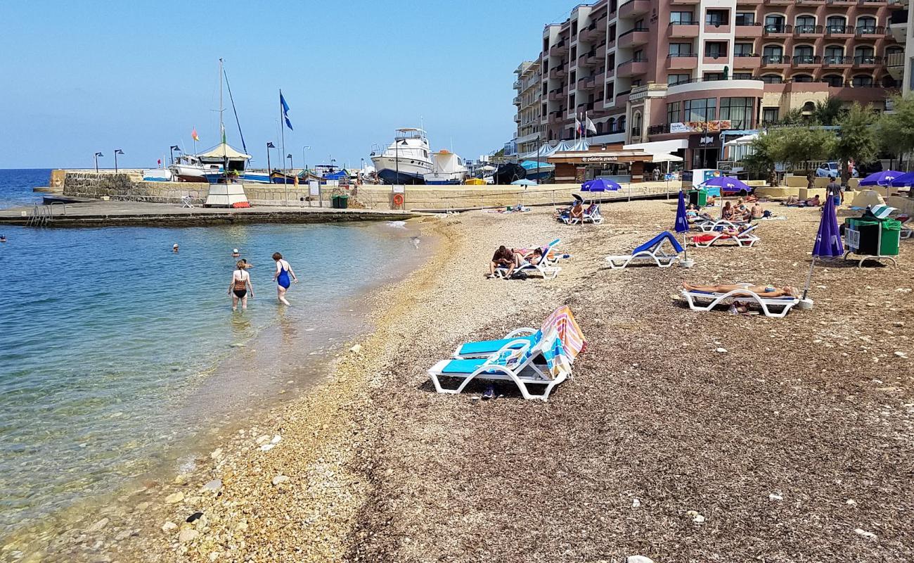 Фото Marsalforn Beach с белая чистая галька поверхностью