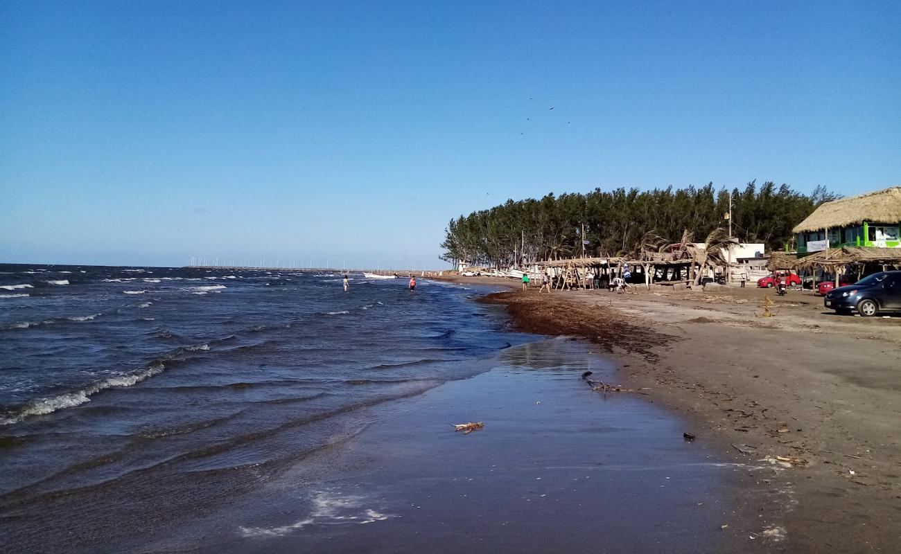 Фото Playa Anton Lizardo с светлый песок поверхностью