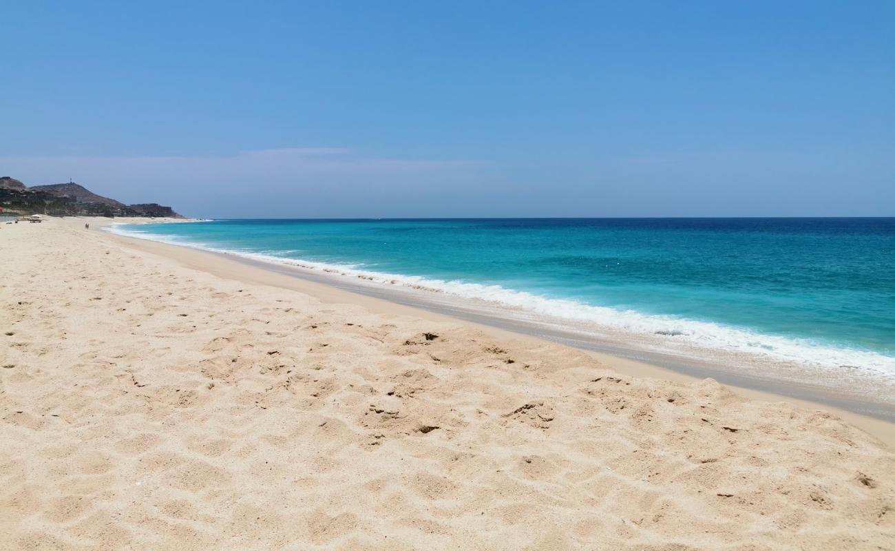 Фото Playa Cabo Real с светлый песок поверхностью