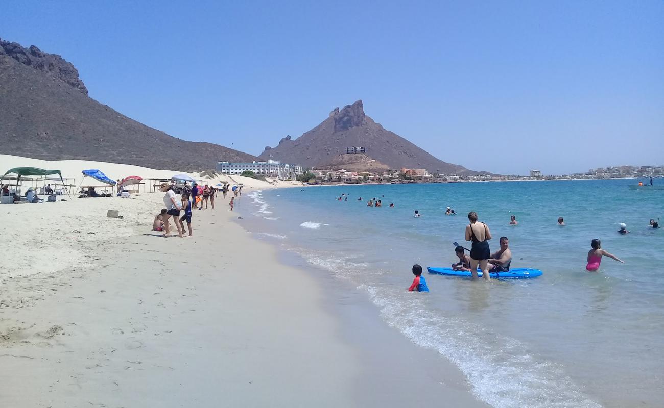 Фото Los Algodones beach с светлый песок поверхностью