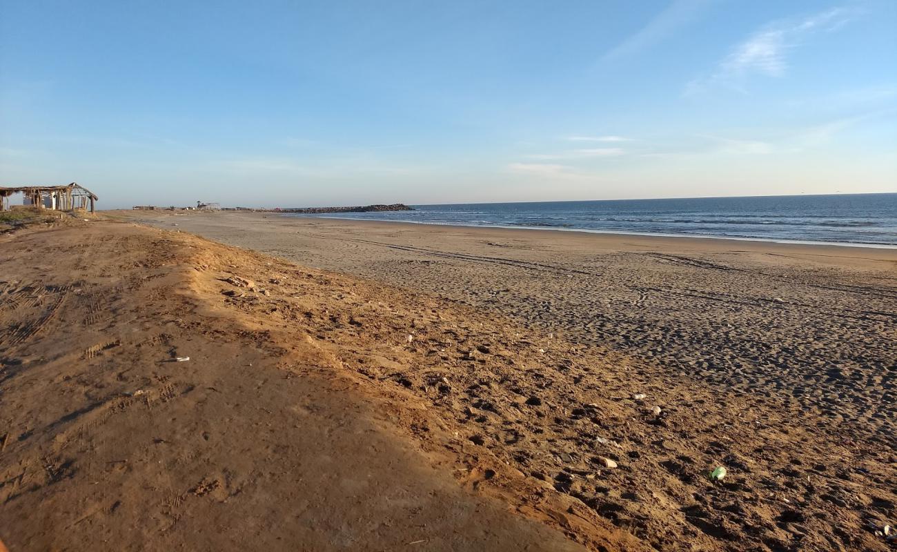 Фото Ponce beach с светлый песок поверхностью