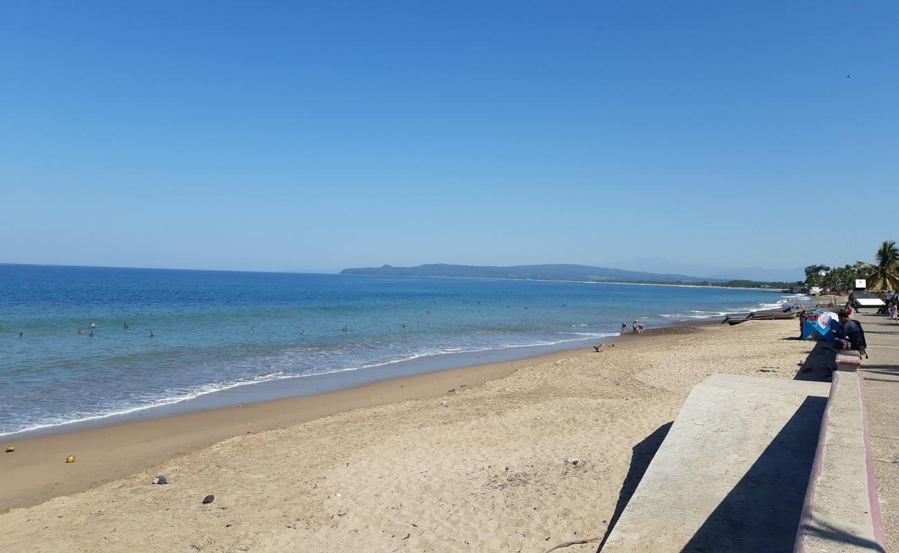 Фото El Naranjo beach II с золотистый песок поверхностью