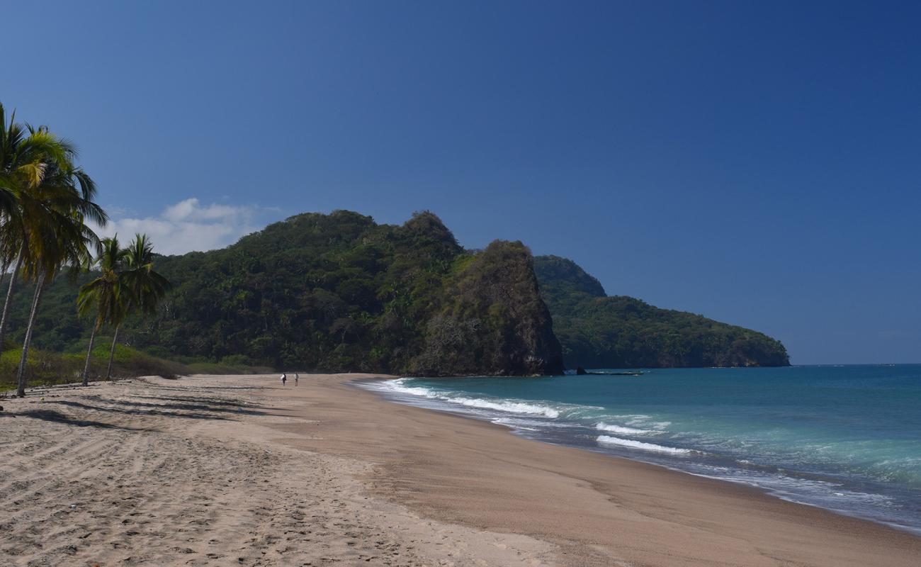 Фото Canalan beach с золотистый песок поверхностью