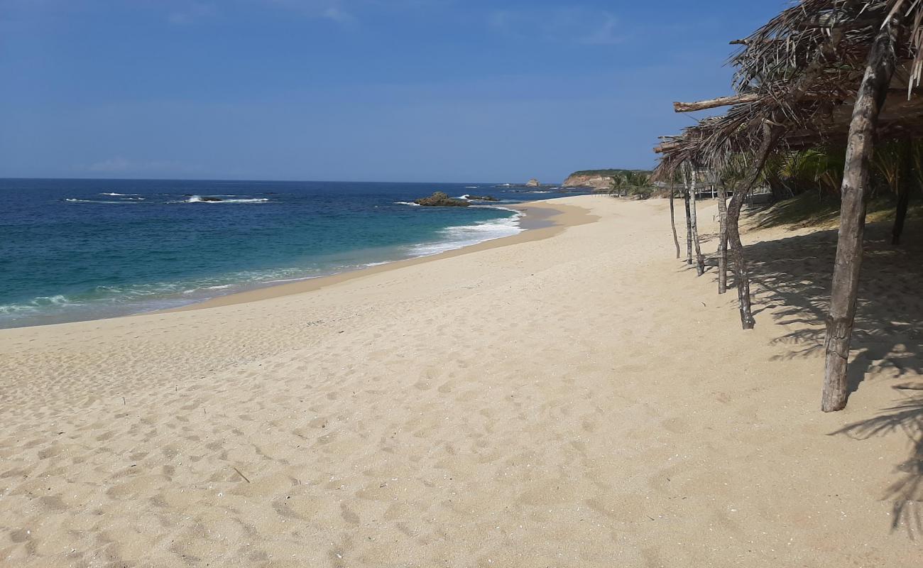 Фото Playa La Palma Sola с светлый песок поверхностью