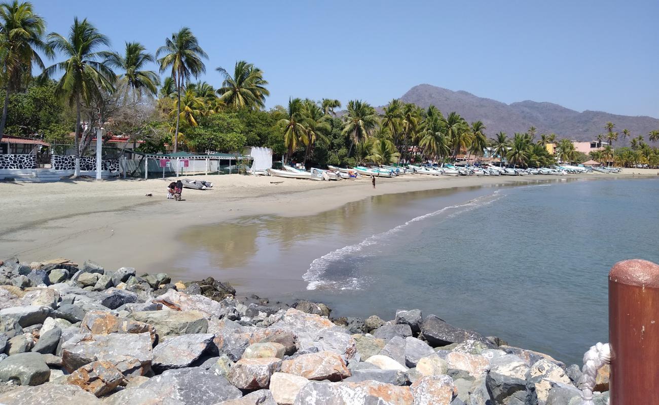 Фото Zihuatanejo beach с серый песок поверхностью