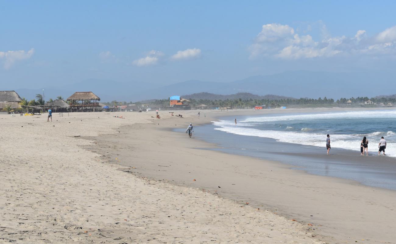 Фото Playa de Chacahua с светлый песок поверхностью