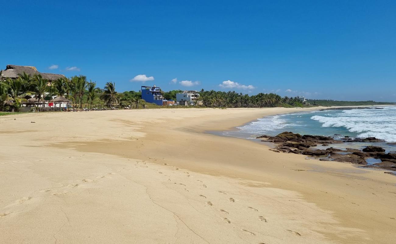 Фото Playa Agua Blanca с золотистый песок поверхностью