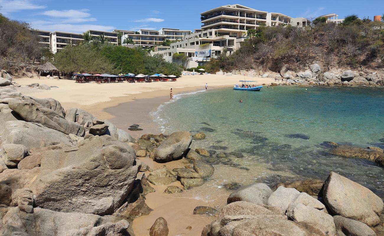 Фото Arrocito beach с светлый песок поверхностью