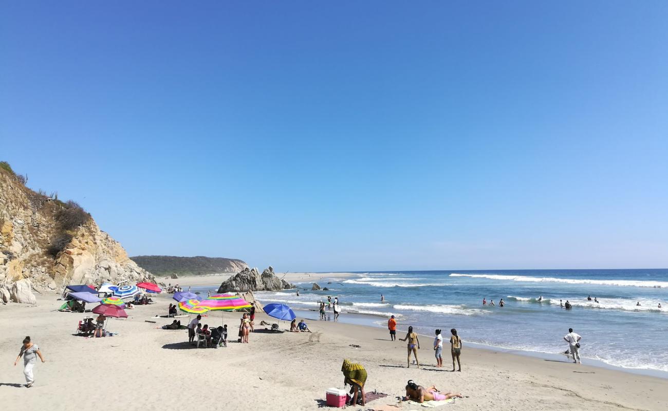 Фото Bocana beach с серый песок поверхностью