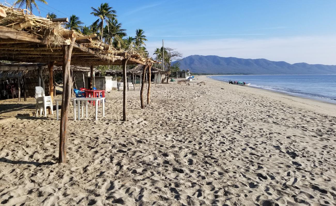 Фото Cangrejo beach с светлый песок поверхностью