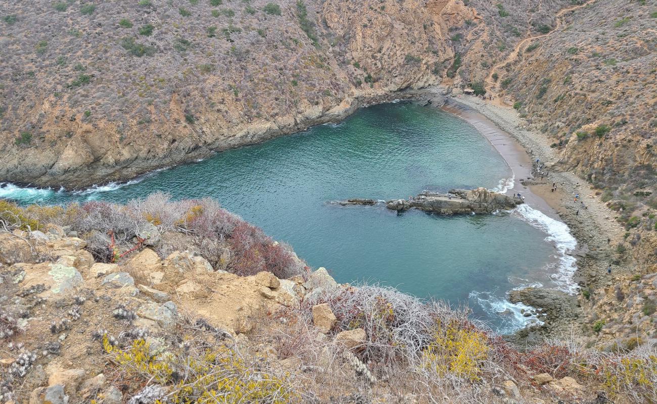 Фото Playa el Cocodrilo с песок с камнями поверхностью