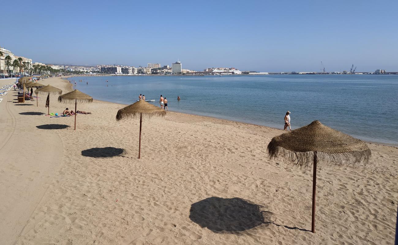 Фото Playa de los Carabos с золотистый песок поверхностью