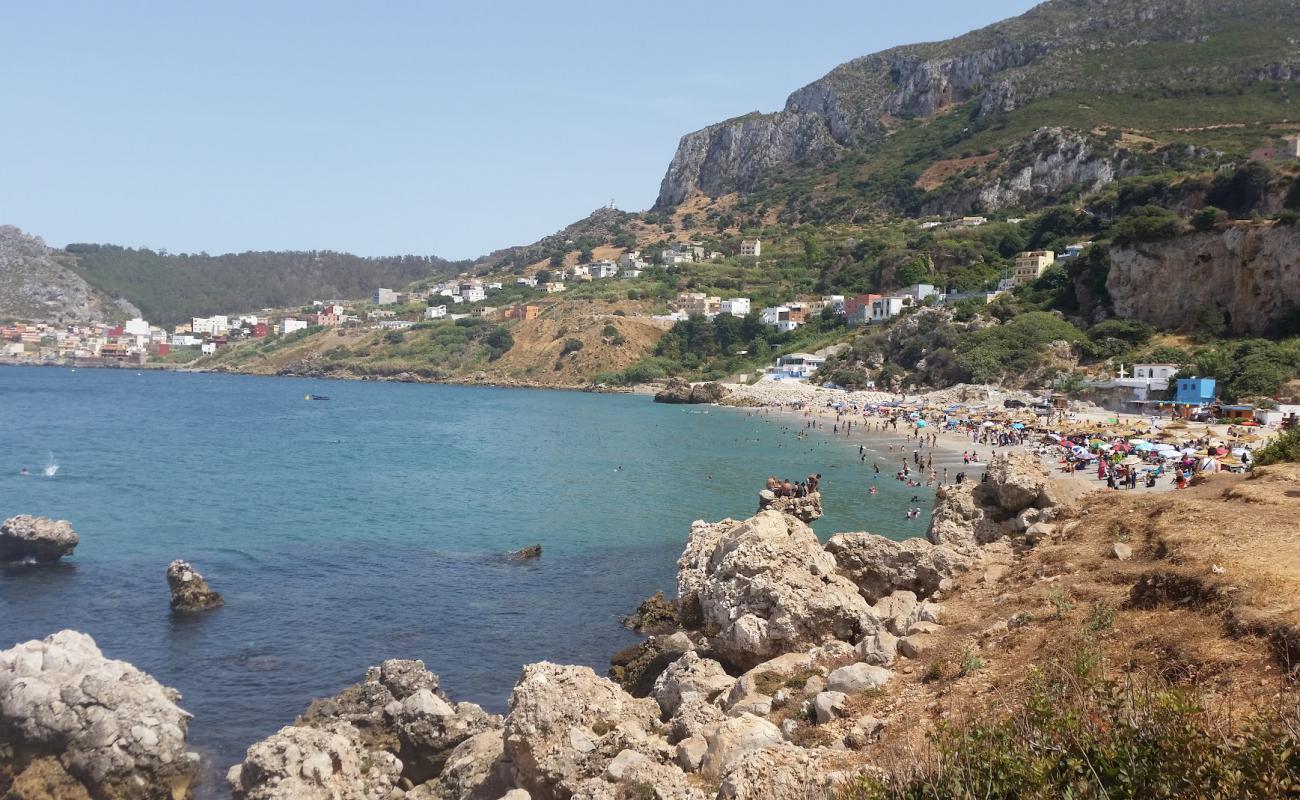 Фото Playa Belyounech с светлый песок поверхностью