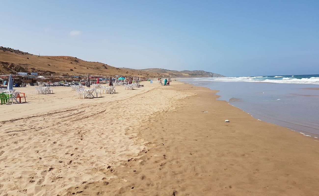 Фото Plage Des Coves, Asilah с золотистый песок поверхностью