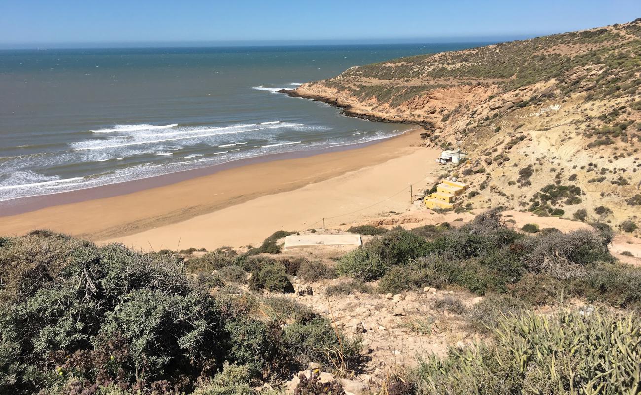 Фото Plage Iftane с золотистый песок поверхностью