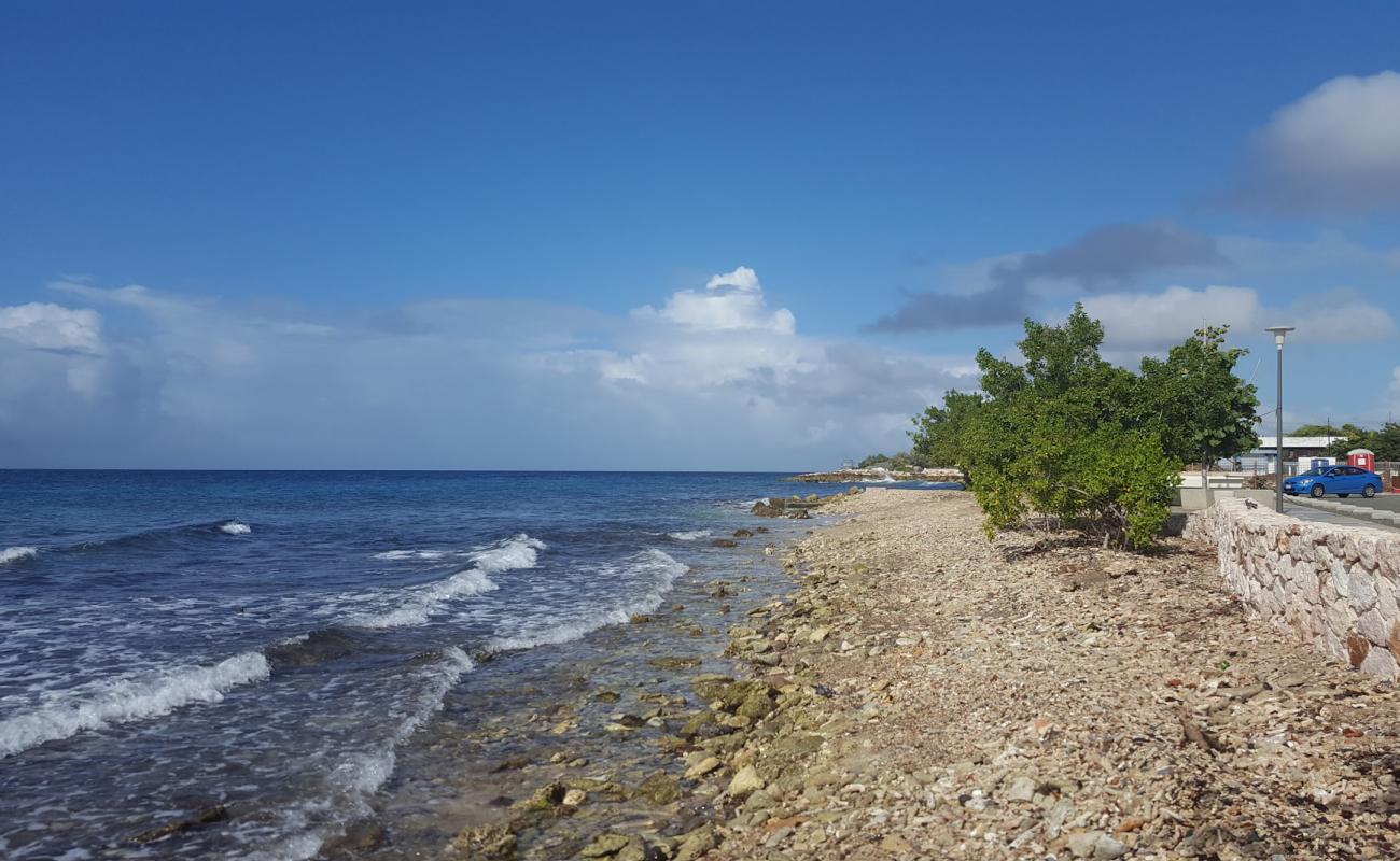 Фото Marie Pampoen beach с песок с камнями поверхностью