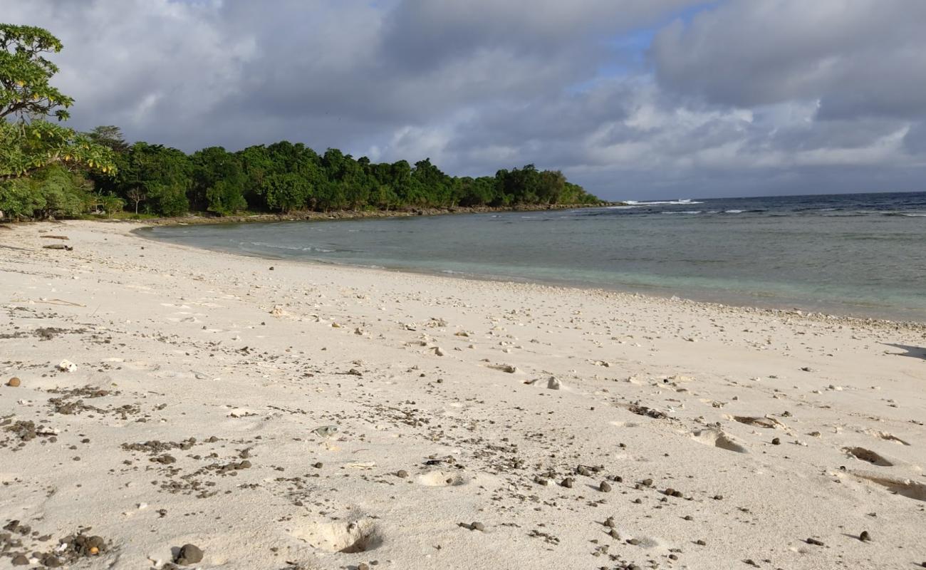 Фото Honemoon Beach с светлый песок поверхностью