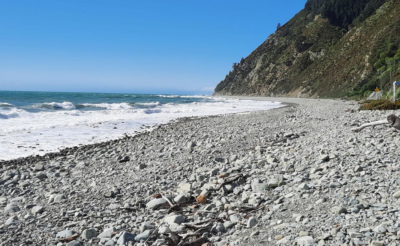 Фото Glenduan Beach II с серая галька поверхностью