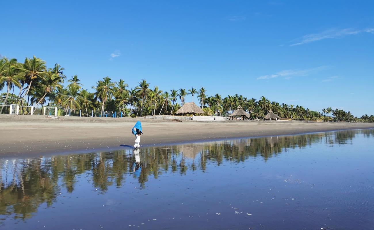 Фото Poneloya beach с серый песок поверхностью