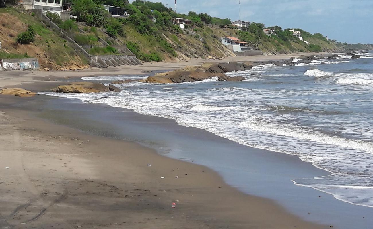 Фото Playa La Boquita с светлый песок поверхностью