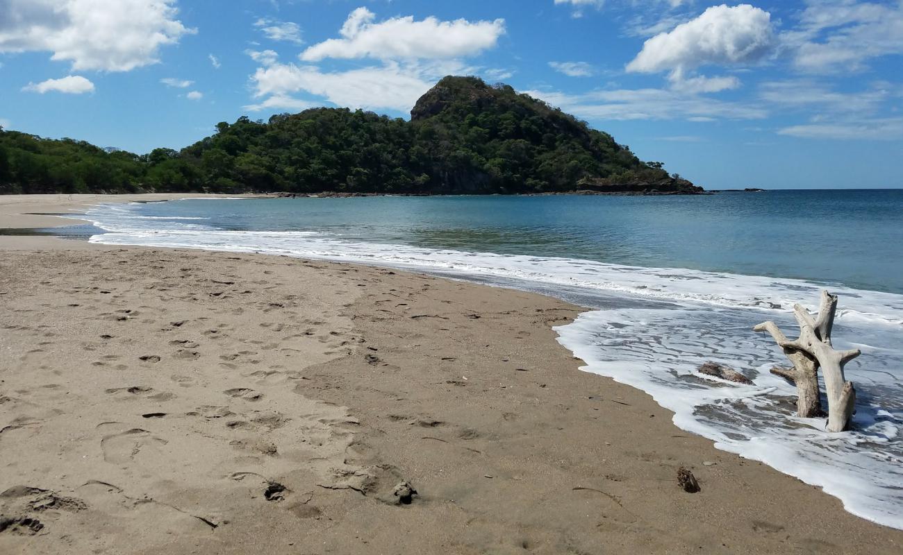 Фото Playa Gigante с светлый песок поверхностью