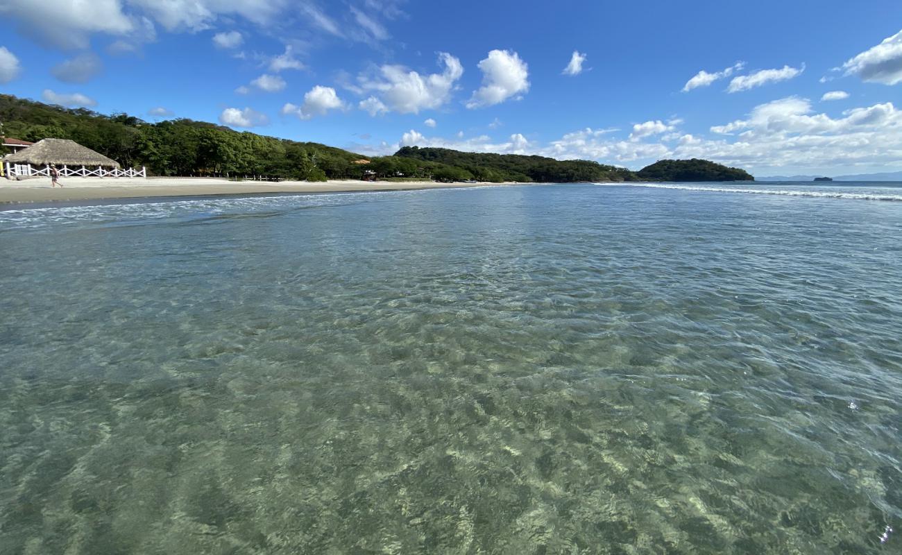 Фото Playa El Coco с светлый песок поверхностью